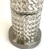 Round metal base with silver finish provides stability to this lamp.